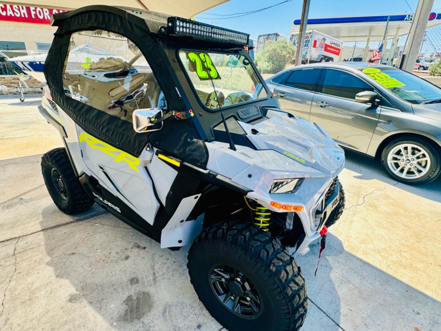 2023 grey Polaris RZR Trail Ultimate (3NSA5K879PH) , located at 2190 Hwy 95, Bullhead City, AZ, 86442, (928) 704-0060, 0.000000, 0.000000 - On consignment. This super clean 2023 Polaris RZR trailride ultimate. Only 689 miles.RIDE COMMAND® 7” Glove-Touch Display: Built-In GPS, Group ride (cell and non-cell communications), Topographic Mapping, Bluetooth & USB Smartphone Connectivity, AM/FM & Weather Radio Capable, In-Vehicle Communica - Photo#1